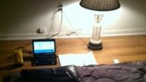 a laptop and a table lamp on a desk