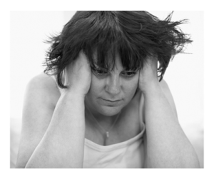 divorce-whirlwind-Woman-Holding-her-Head-300x251.png