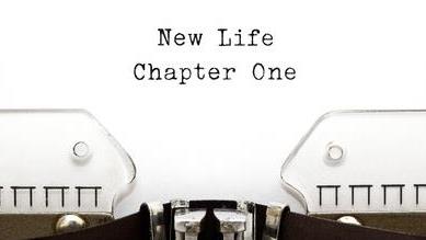 A page in a typewriter reads 'New Life Chapter One'