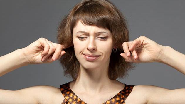 Woman Stopping Up Ears.jpg