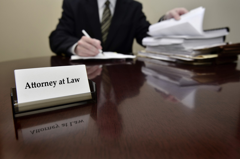 divorce attorney sitting behind a desk
