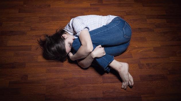 Woman Crying on Floor.jpg