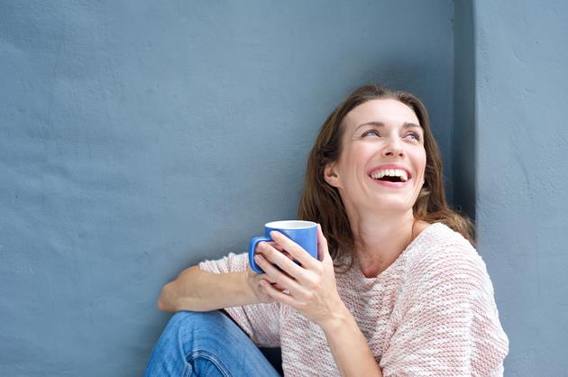Woman smiling Coffee.jpg