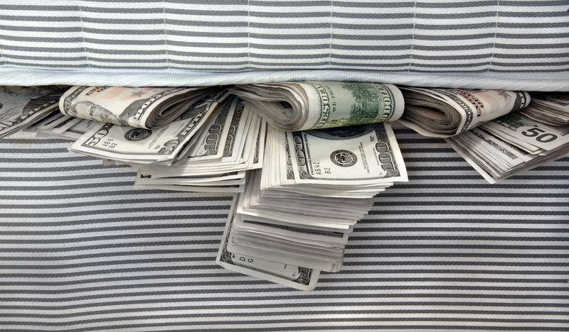 Money stuffed in a mattress